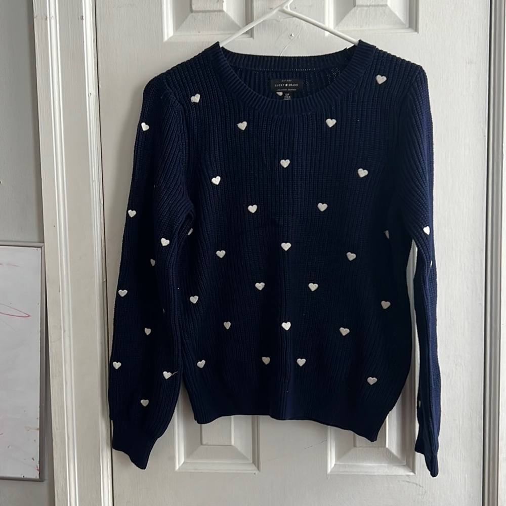 Dark blue sweater with white hearts